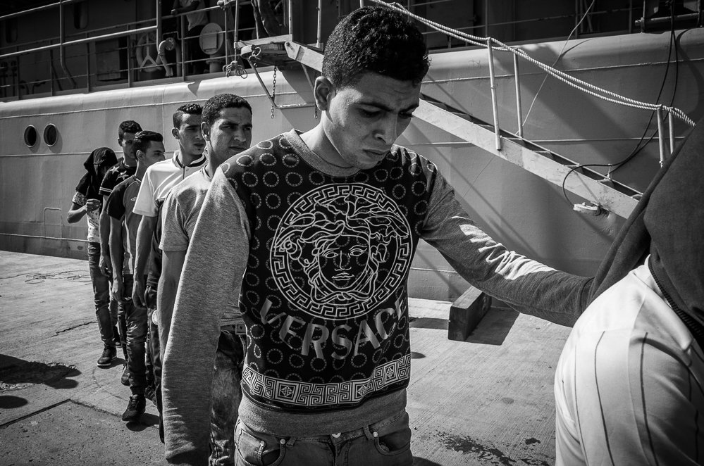 detained and deported Photo